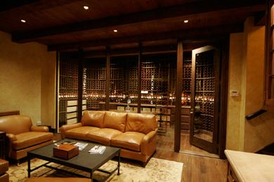 Image: Sitting Room with Clear Door Displaying Wine Cellar