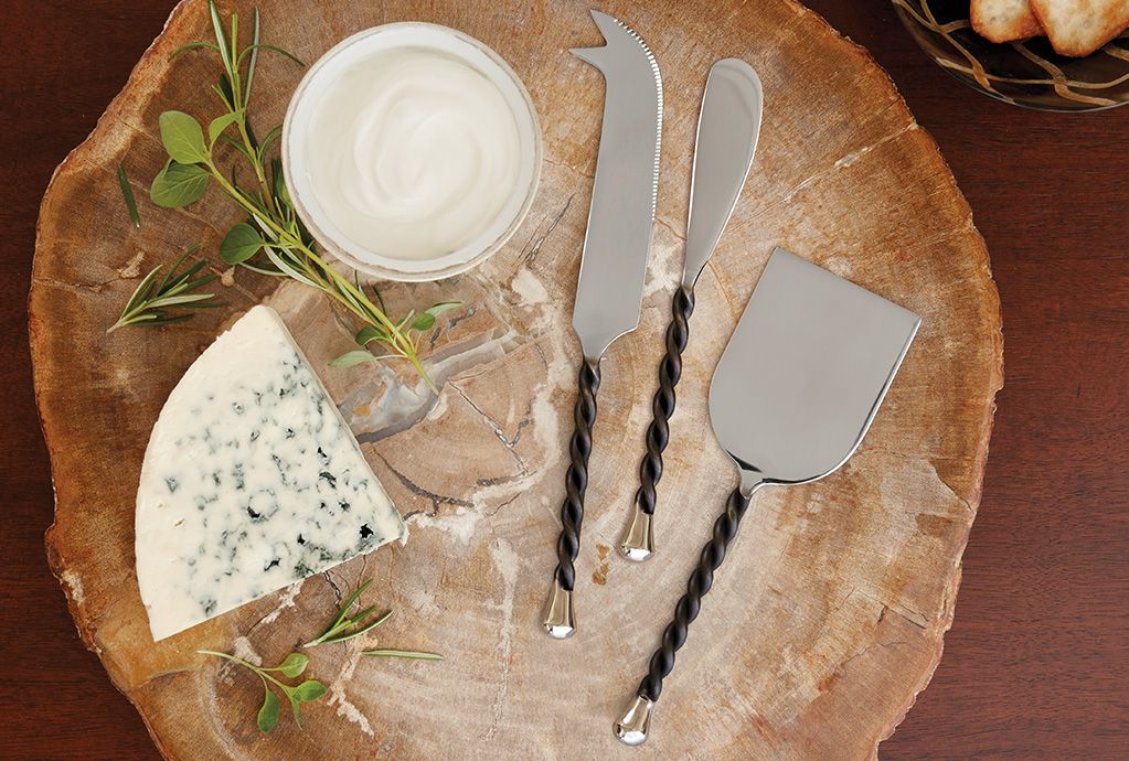 Piega Artisan Cheese Knives and a Petrified Wood Platter