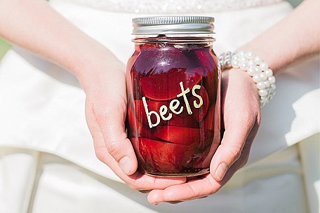Beets written on a glass jar filled with beets.