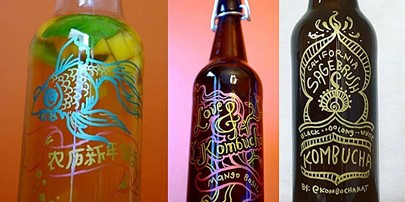 Designs with custom Kombucha designs on glass bottles.
